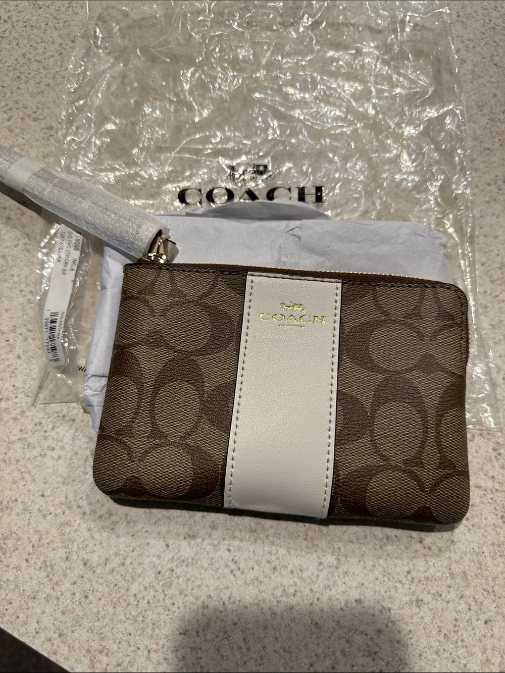 Coach Brown Signature Canvas Wristlet with Cream Stripe